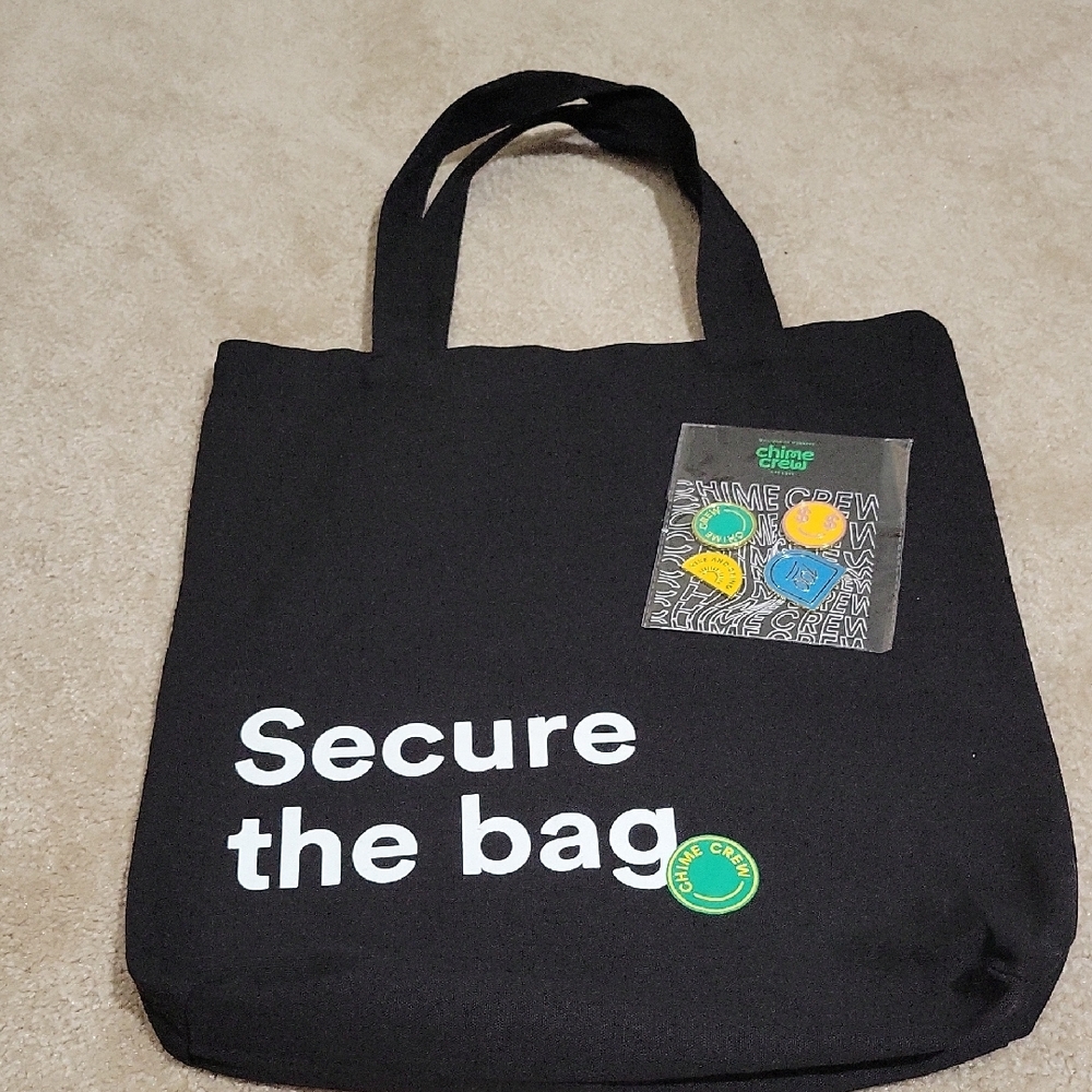 Free With Any Other Purchase! Chime Black Tote Bag with White Text And Pins